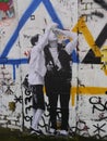 Graffiti depicting two young people.