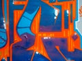 Graffiti details with blue and orange dominant