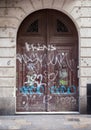 Graffiti on entrance gate of a building, Barcelona Royalty Free Stock Photo