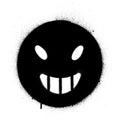 Graffiti evil smile icon sprayed in black and white