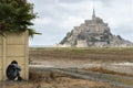 Graffiti on a fence and Mont Saint Michel