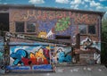 Graffiti filled warehouse wall, Christiania, Copenhagen, Denmark Royalty Free Stock Photo