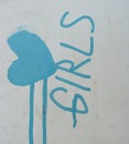 Graffiti font girls and leaking love heart in blue