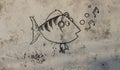 Graffiti of funny singing fish of on the wall Royalty Free Stock Photo