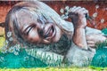 Graffiti of girl with flowers, Villarrica, Chile