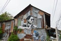 Graffiti for memorial to his Majesty King Bhumibol Adulyadej on old house wall