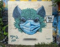 Graffiti mural at the Fabrication Yard in Oak Cliff featuring surrealistic animal wearing a coronavirus protection mask.