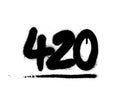 Graffiti 420 number sprayed in black over white