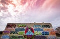 Graffiti on an old brick building . Royalty Free Stock Photo