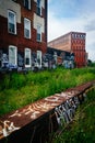 Graffiti on an old brick building, seen from the Reading Viaduct Royalty Free Stock Photo