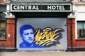 Graffiti on old hotel entrance symbolizing the Ukraine - Russia War