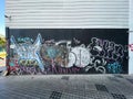 Graffiti painted black textured wall street urban art