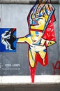 A graffiti painting on the East Side Gallery wall in Berlin, Germany Royalty Free Stock Photo