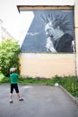 Graffiti portrait of Mikhail Gorshenev on street wall, russian punk rock artist from the music band Korol i Shut - Saint Royalty Free Stock Photo