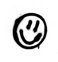 Graffiti smiling face emoticon in black on white