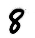 Graffiti sprayed number 8 eight in black on white