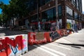 Graffiti on street barricades on Capitol Hill