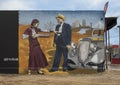 Graffiti style Bonnie & Clyde mural by Armando Aquirre in Oak Cliff, Dallas, Texas.