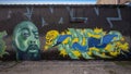 Graffiti style mural with a surrealistic self-portrait by Jeremy Biggers on Fabrication Street in Dallas, Texas. Royalty Free Stock Photo