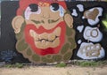 Graffiti style street art mural with bearded man at the Fabrication Yard in Dallas, Texas.