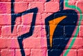 Graffiti on the textured brick wall Royalty Free Stock Photo