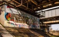 Graffiti under the railway bridge Royalty Free Stock Photo