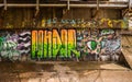 Graffiti under the railway bridge Royalty Free Stock Photo