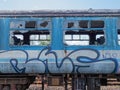 Graffiti and vandalism on old abandoned train Royalty Free Stock Photo