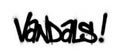 Graffiti vandals word sprayed in black over white Royalty Free Stock Photo