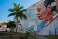 Graffiti on the wall of a building in the city Campeche, drawing a man on his hand a dove sits. San Francisco de Campeche, Mexico. Royalty Free Stock Photo