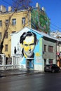 Graffiti on the wall depicting a portrait of Ivan Leonidov