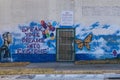 Graffiti on the wall with the text "Speak your dreams into existence"