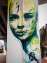 Graffiti women Wall art on a subway piller