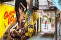Graffitied mural of Hong Kong martial arts legend Bruce Lee in Wan Chai, Hong Kong
