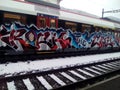 Graffiti letter and character on Swiss train - graffitikunst Schriftzug und Charakter auf einem SBB S-Bahn zug Royalty Free Stock Photo