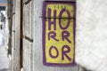 Graffito `Horror` on a house wall in Vienna, Austria, Europe