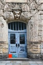 Graffitti on the door of an art nouveau house in Dresden