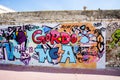 Graffitti by the River Chillar which runs around the edge of the village of Nerja in Andalucia Spain. Royalty Free Stock Photo