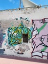 Graffitti by the River Chillar which runs around the edge of the village of Nerja in Andalucia Spain. Royalty Free Stock Photo