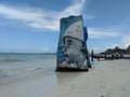 Grafitti-covered ruins by the beach in Holbox, Mexico