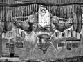 Grafitti of muscular santa claus on side of building in HCMC Vietnam