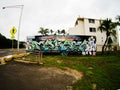 Grafitti Tag in Fisheye View of Street in Makaha Hawaii