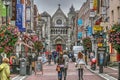 Dublin, Ireland Grafton Street Mall. Brilliant colors of shoppers and shops highlight this photo. 