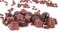 Grain black coffee and chocolate candy on a white background Royalty Free Stock Photo