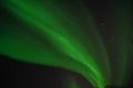 Grain glow green northern aurora lights in clear sky at night in Lofoten Islands Norway
