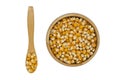 grain corn in wooden bowl with spoon isolated on a white background Royalty Free Stock Photo