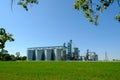 Grain elevator silos. Agriculture factory. Storage tanks agricultural crops processing plant