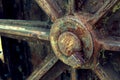 Grain Image: Close up of old machine factory made of steel and used in the past. Broken and rustic machine left over in abandon fa Royalty Free Stock Photo