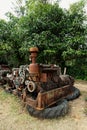 Grain Image: Close up of old machine factory made of steel and used in the past. Broken and rustic machine left over in abandon fa Royalty Free Stock Photo