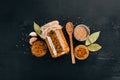 Grain Mustard. Spices On a dark wooden background. Royalty Free Stock Photo